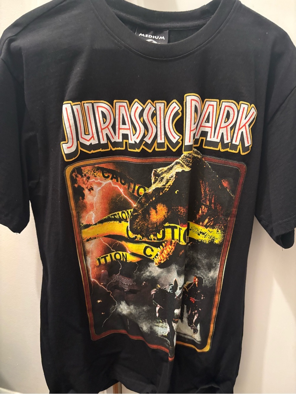 Urban Outfitters Black Jurassic Park Graphic Tee with Yellow Accents
